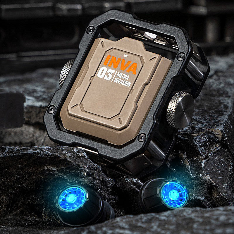 Robotic device with 'INVA' branding on a dark, rocky surface